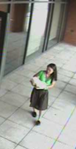 In this surveillance photograph distributed by the Yale Police Department, Annie Le GRD '13 is seen entering 10 Amistad St. on Tuesday morning, when she was last seen.
